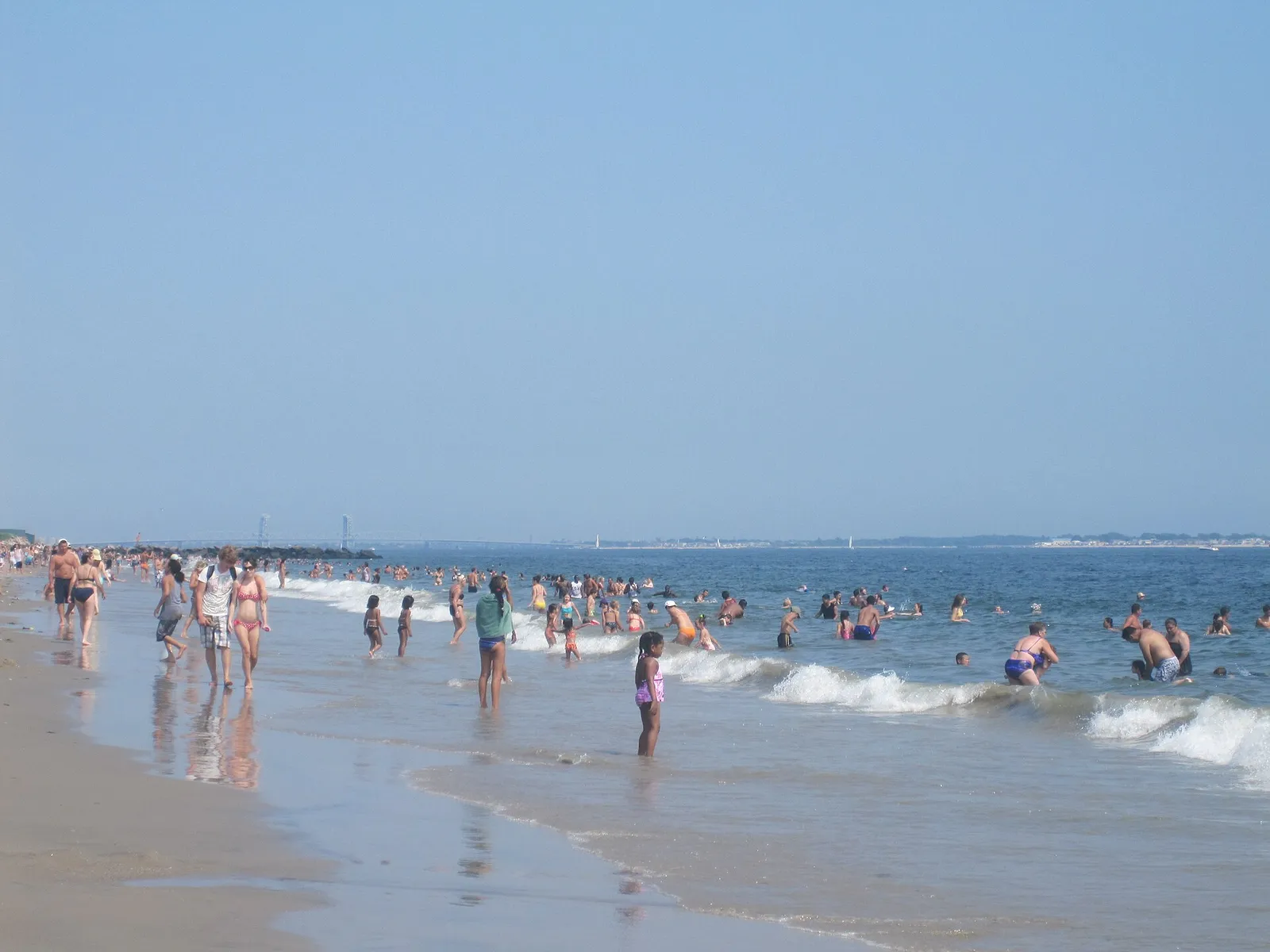 A crowded beach on a hot summer afternoon (illustrative).