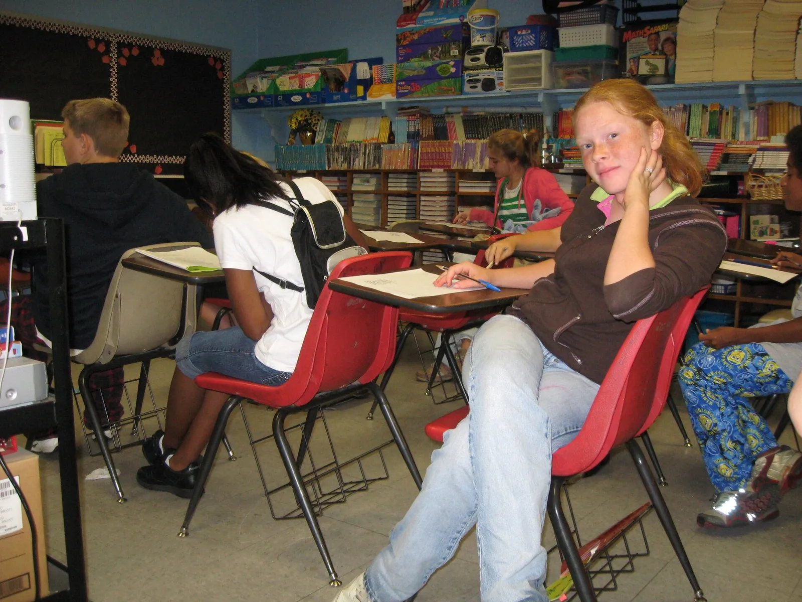 Students at desks in a classroom