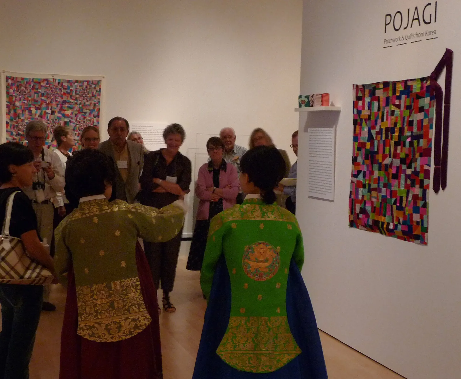 Korean pojagi wrapping cloths on display in a museum exhibition