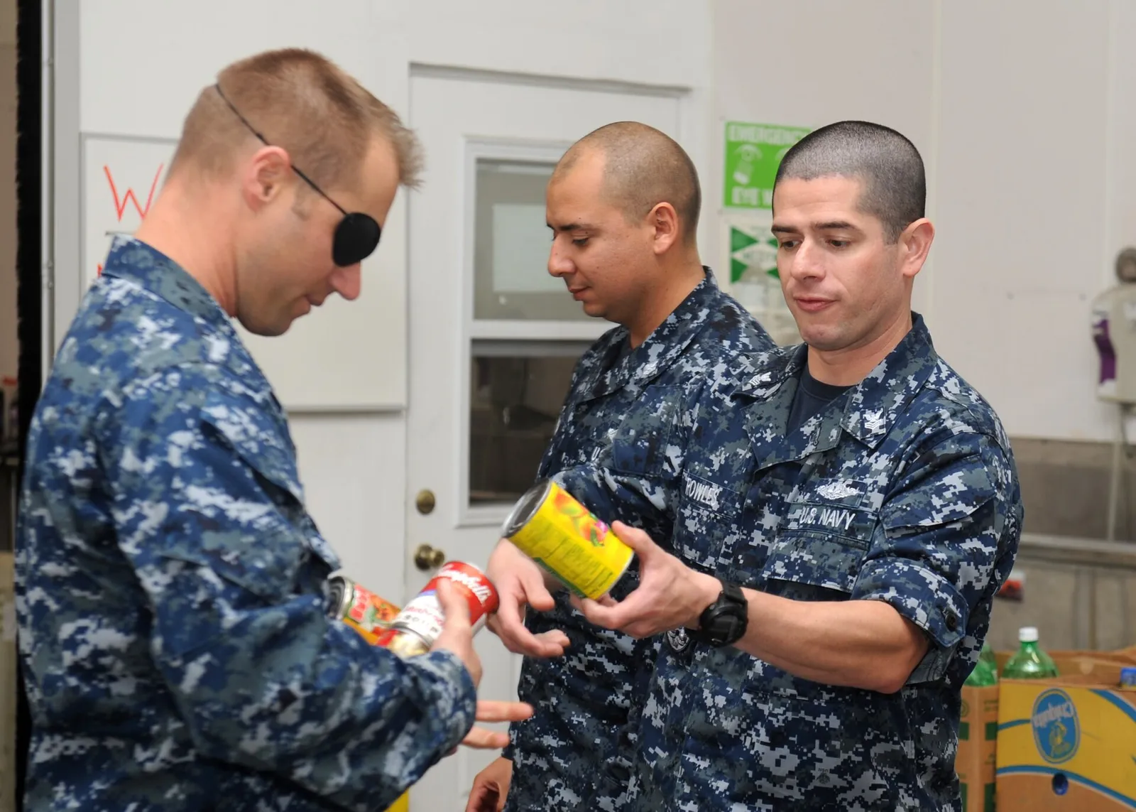 Volunteers sorting donations at a food bank