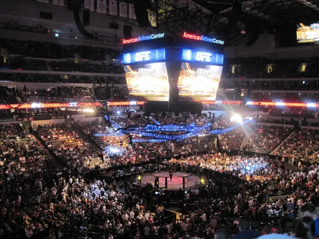A UFC event inside the octagon at an arena