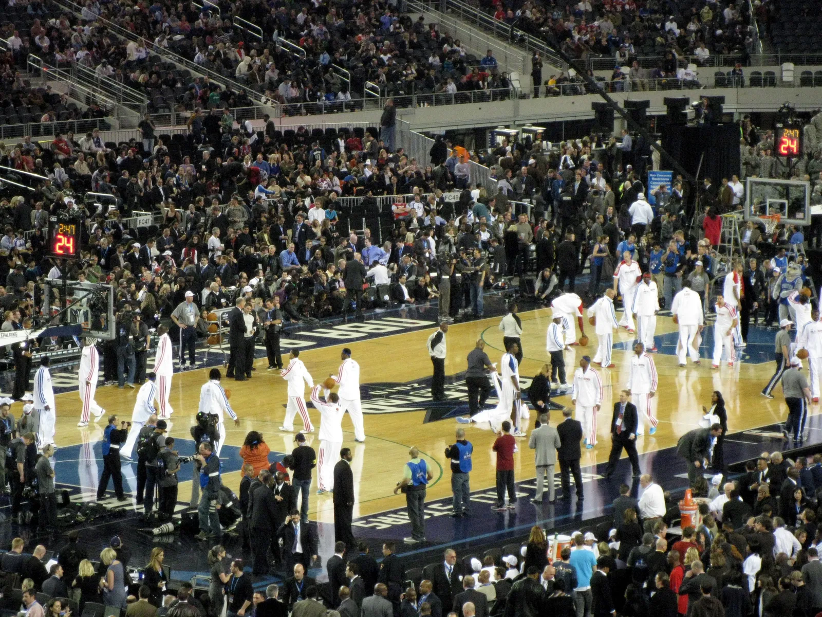 NBA players during a shootaround on the court.