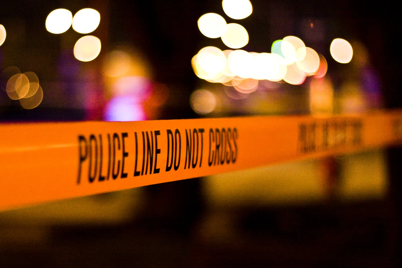 Police line tape at a crime scene.