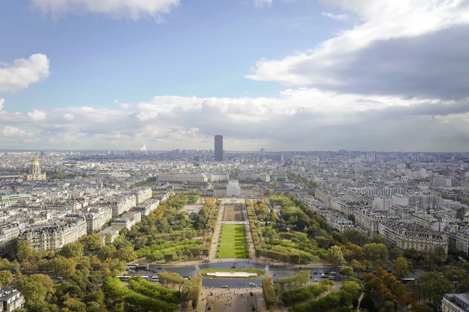 A view over the Champ de Mars and Paris from the Eiffel Tower.