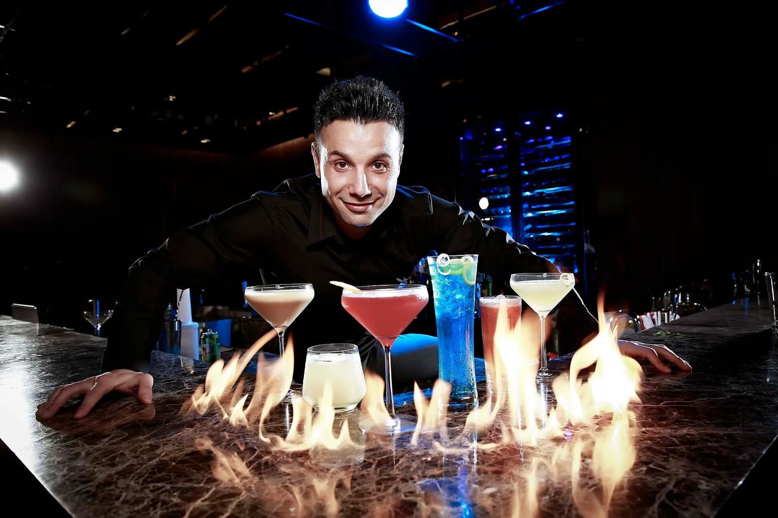 Flaming themed cocktails at a bar
