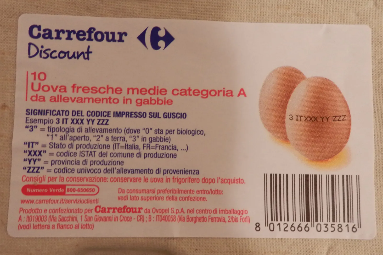 Cartons of eggs on a supermarket shelf.