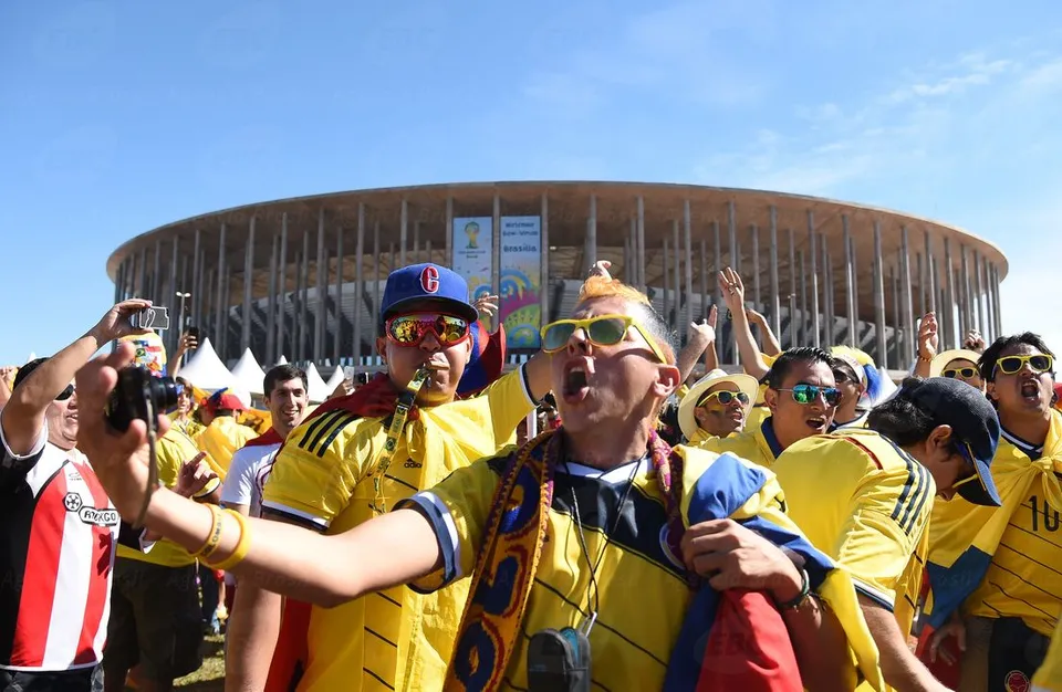 A Colombia soccer fan in team colors.