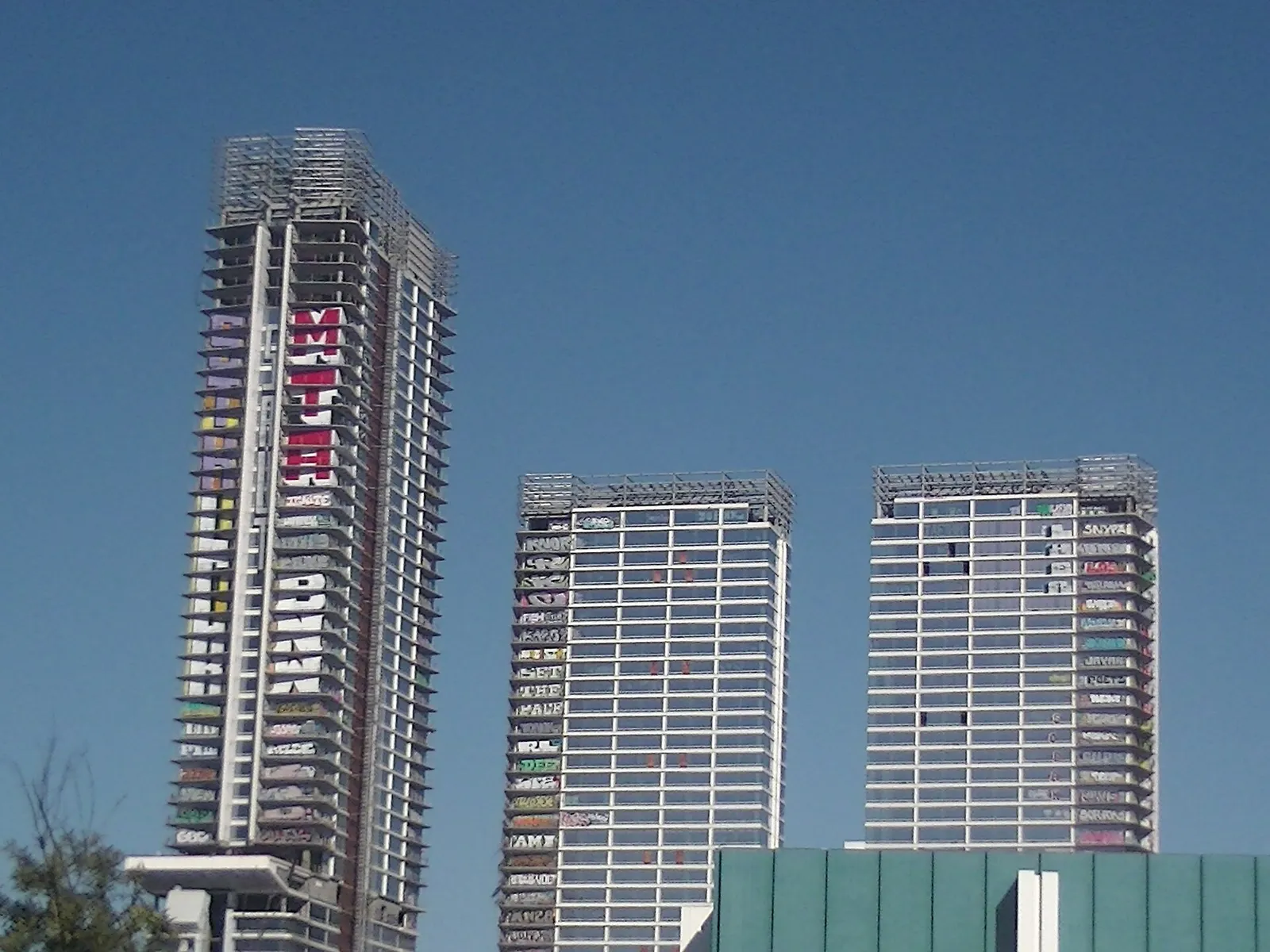The graffiti-covered towers of Oceanwide Plaza in downtown Los Angeles