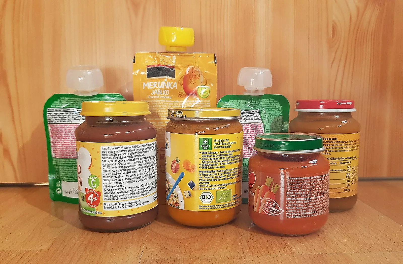 Store-bought fruit and vegetable puree in a jar and a pouch