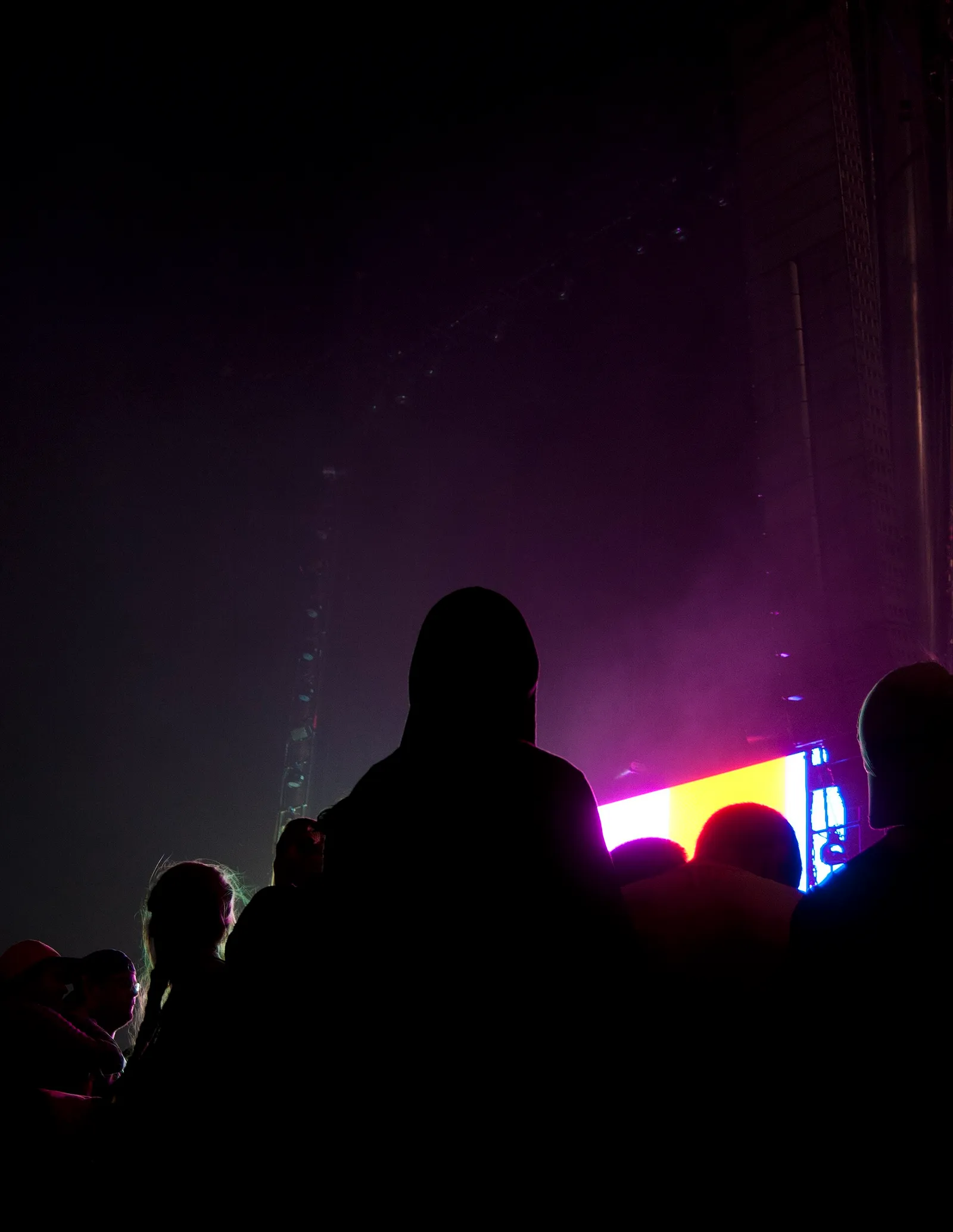 A crowd under stage lights at a concert (file photo).
