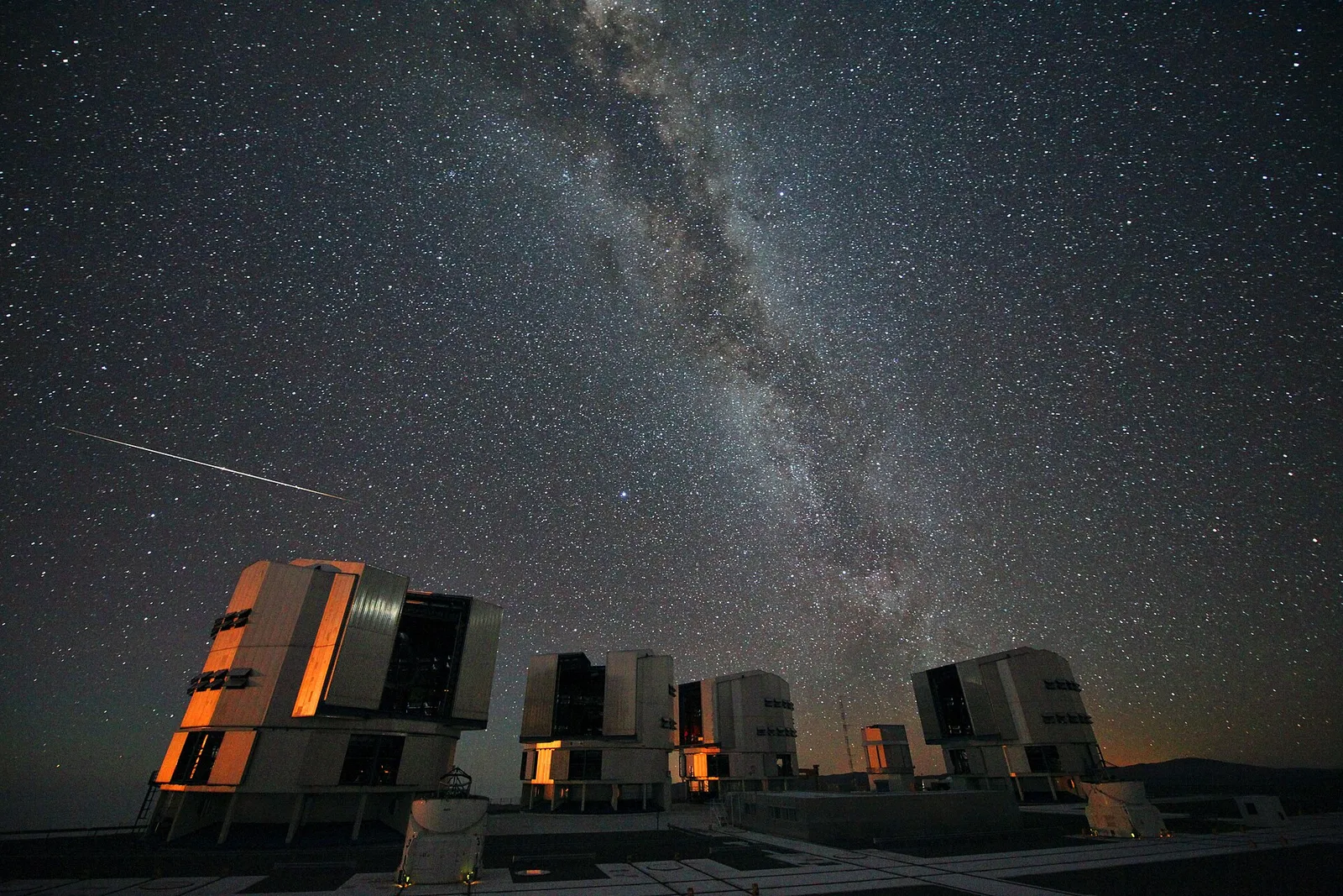 Perseid meteors streaking across a starry night sky