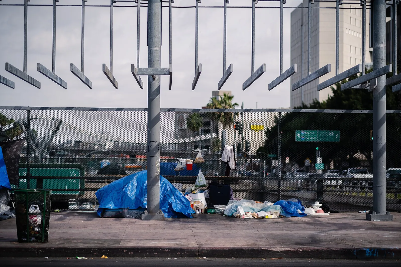 A homeless encampment over a freeway in downtown Los Angeles