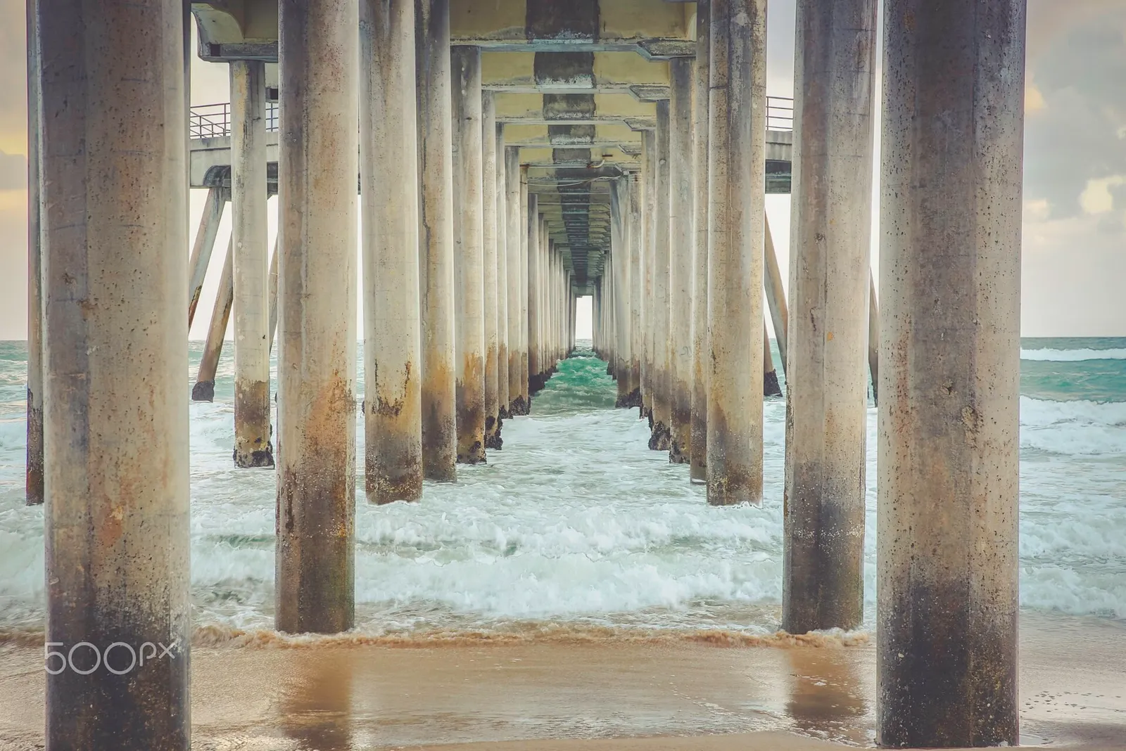 The Huntington Beach pier at sunset.