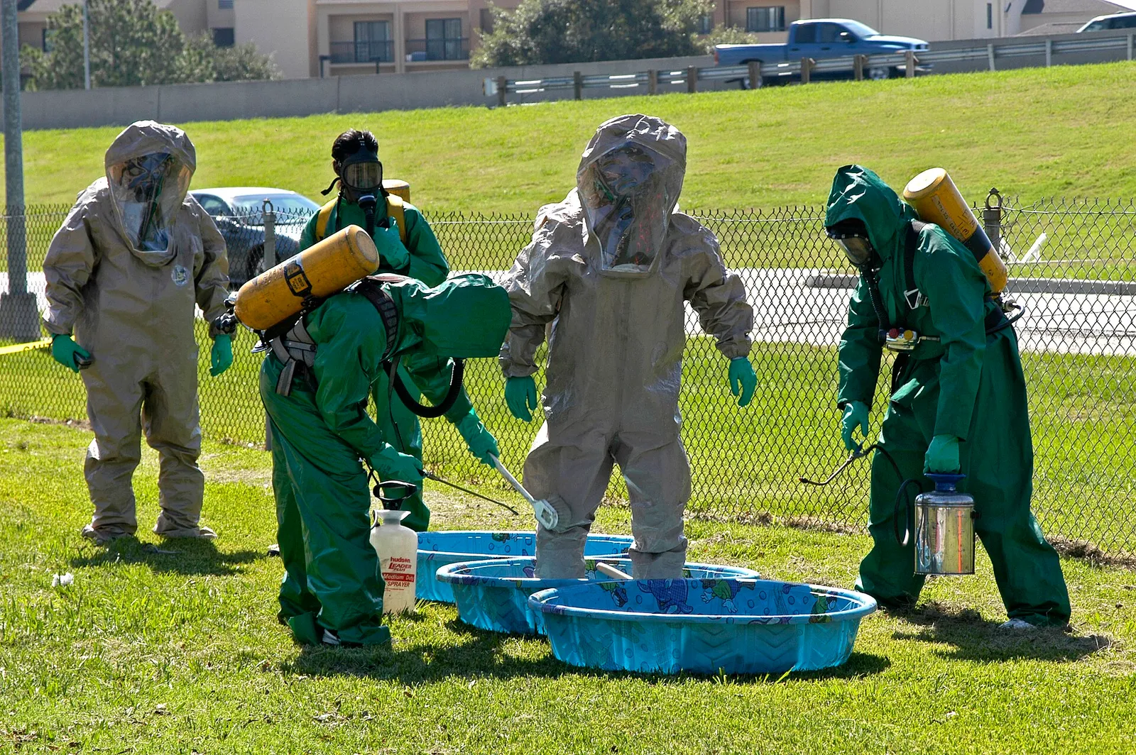 Personnel in hazardous-materials suits (file photo).