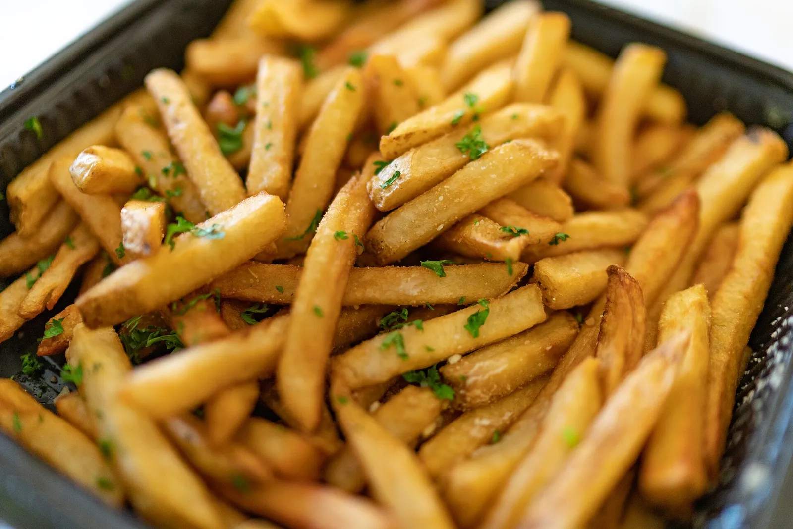 A plate of loaded french fries.