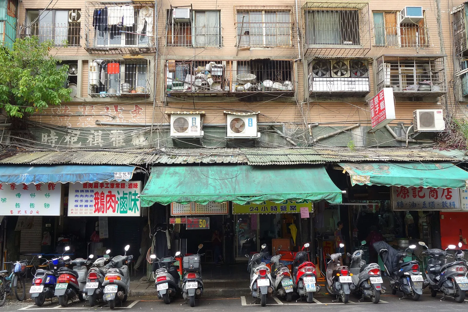 A bank of outdoor air-conditioning condenser units on a building.