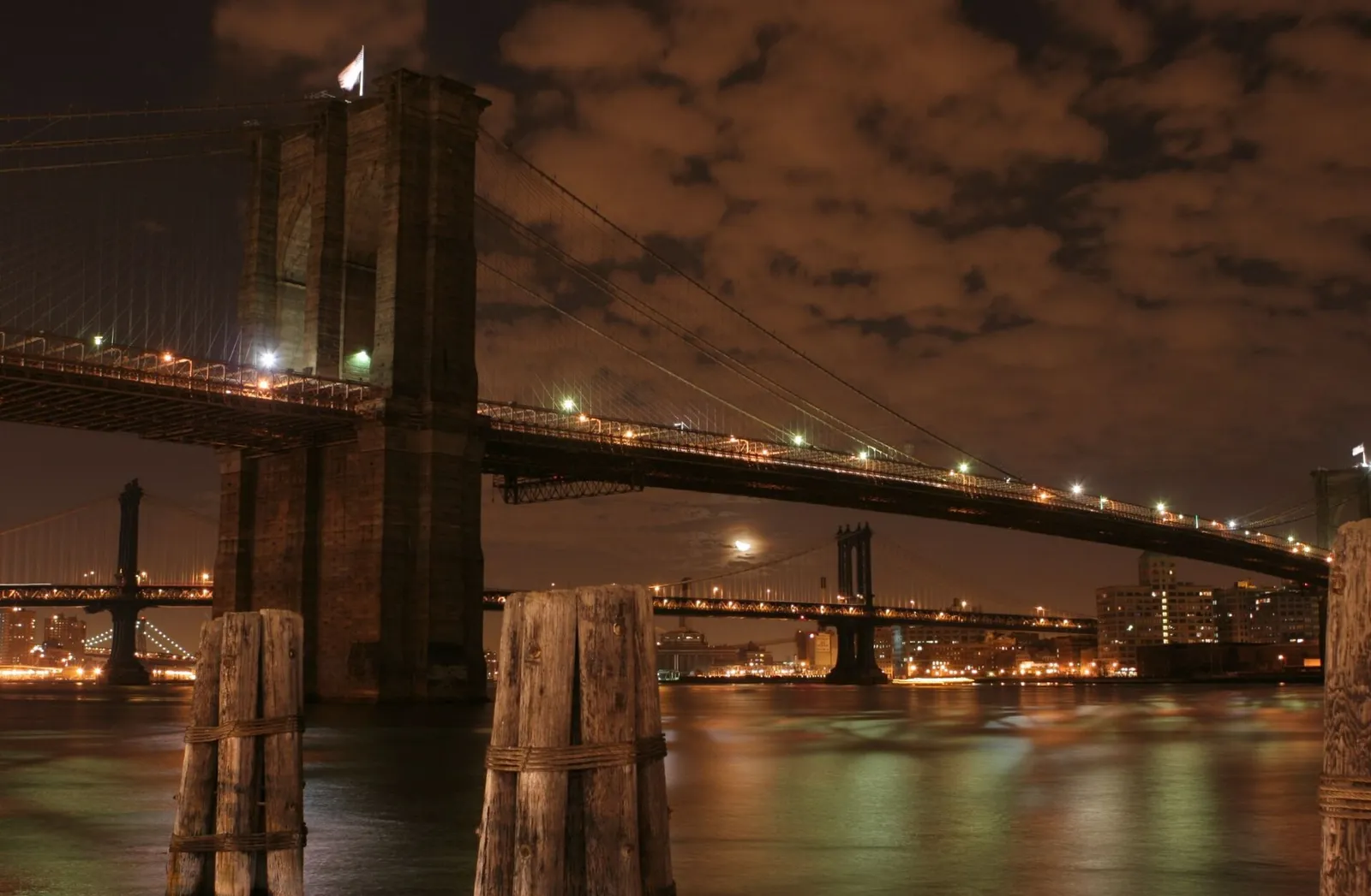 The Brooklyn Bridge in New York at night.