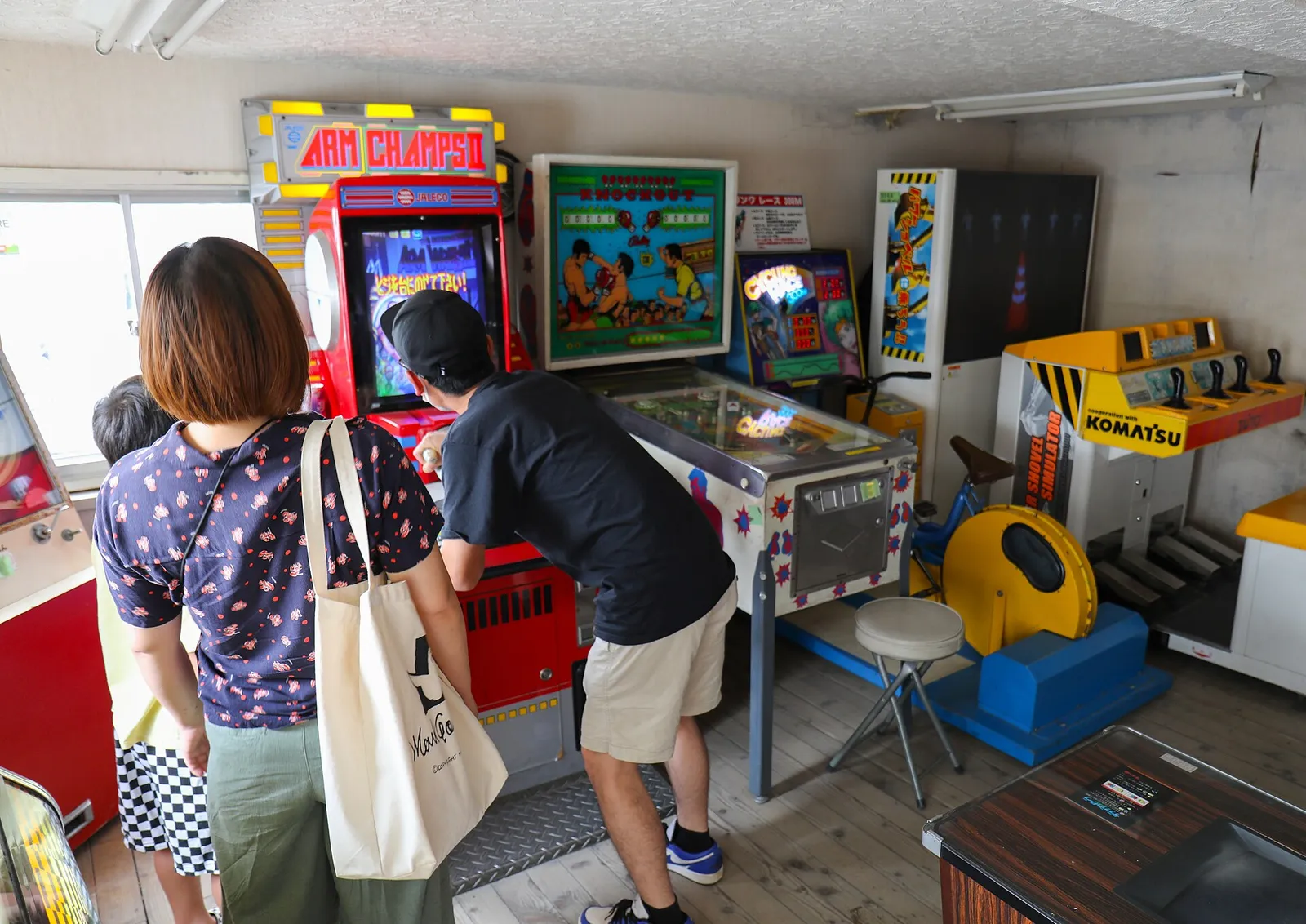 A row of arcade video game machines.