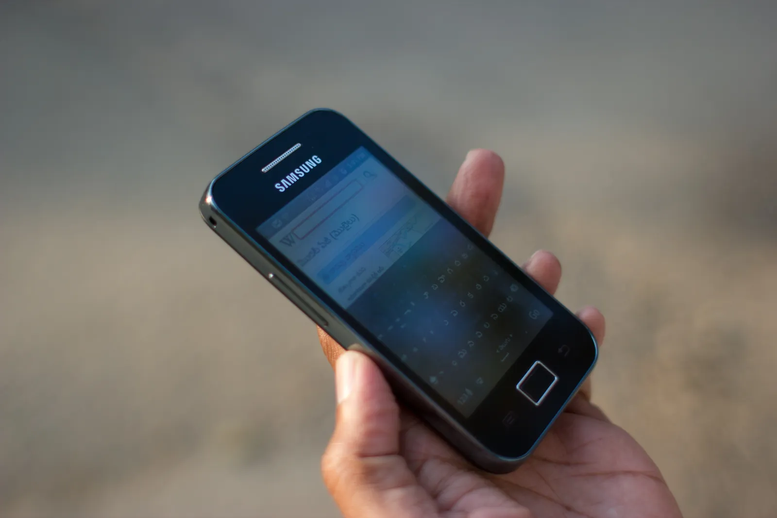 A person uses a smartphone.