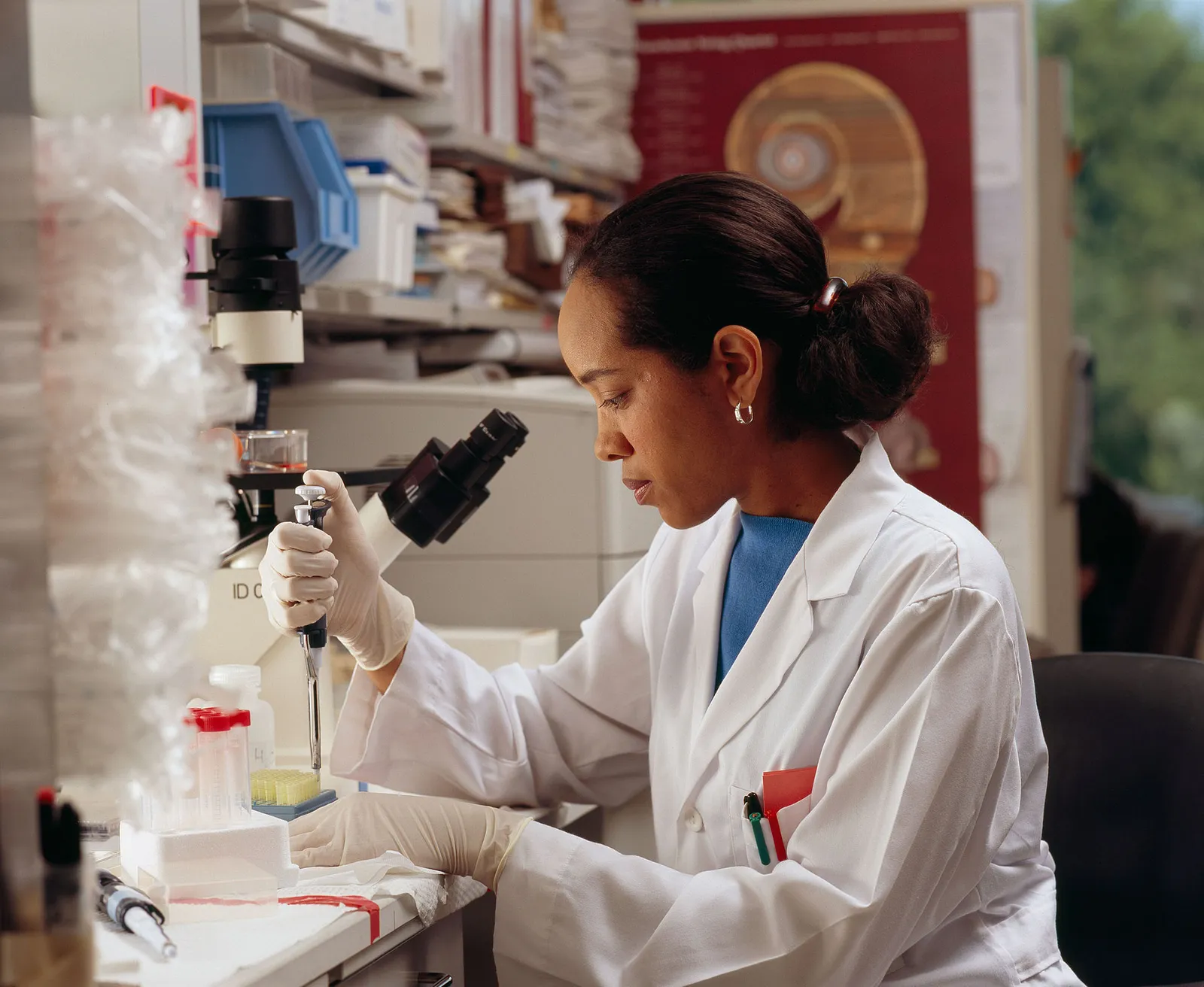 A researcher uses pipettes in a laboratory