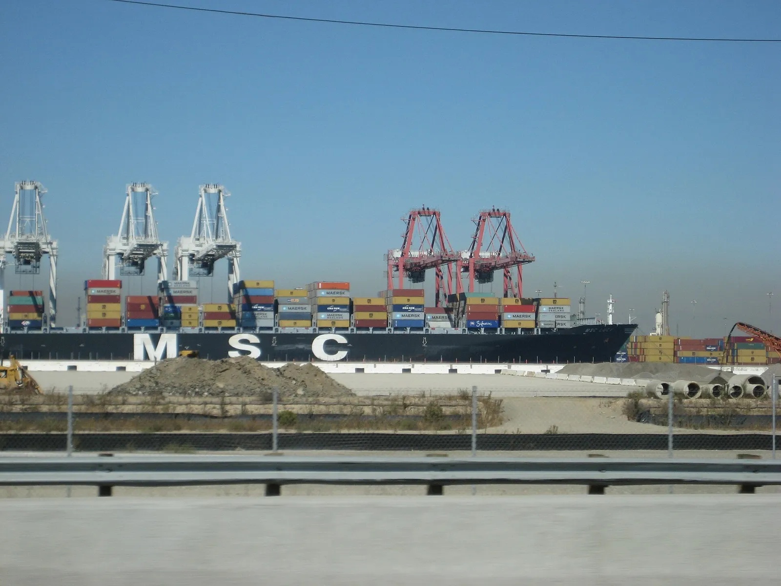 A container ship being loaded at the Port of Long Beach