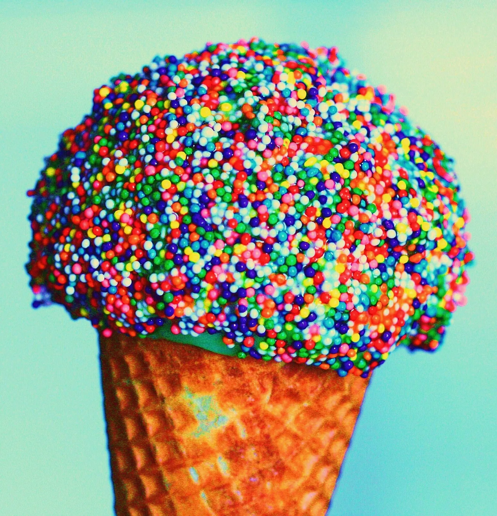 A scoop of ice cream in a cone