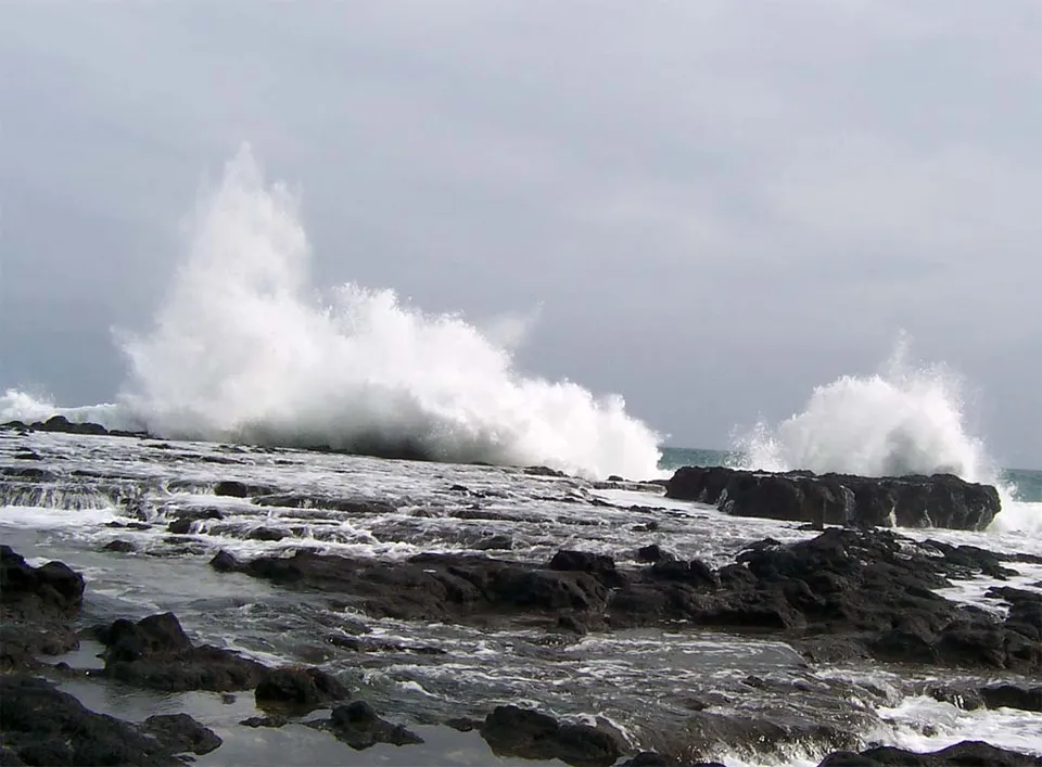 Large waves breaking against a shoreline