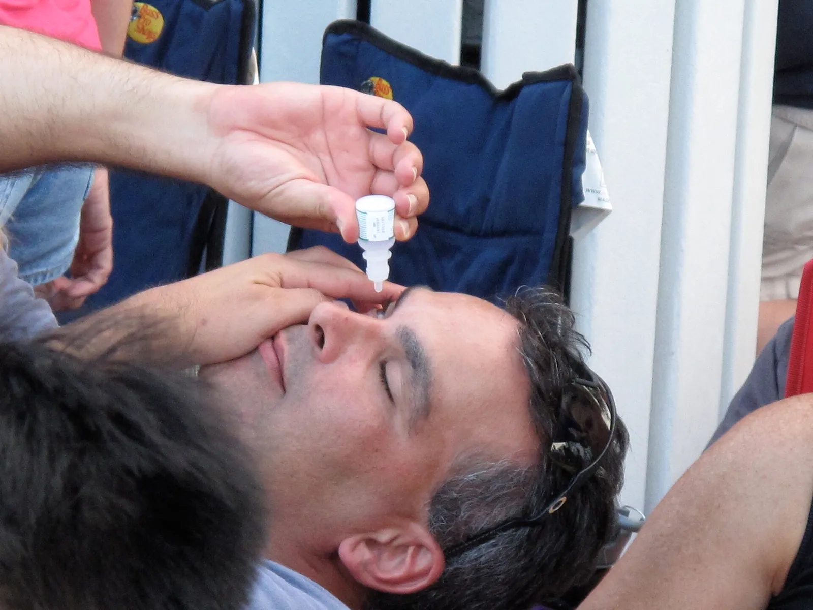 A person applying eye drops (file photo).