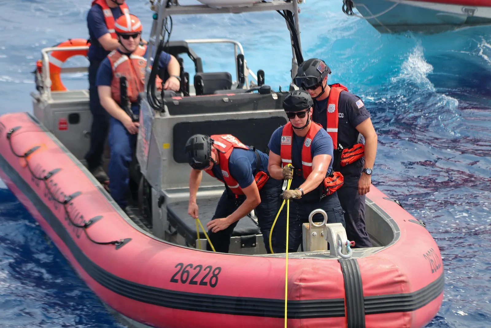 A U.S. Coast Guard small boat crew at sea