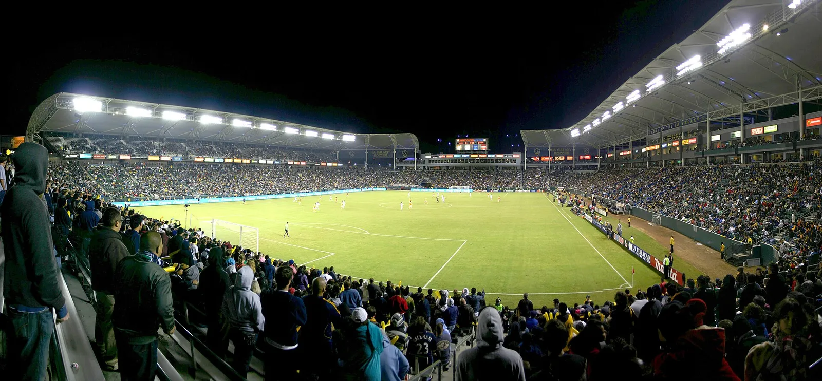 A packed soccer stadium during a match.