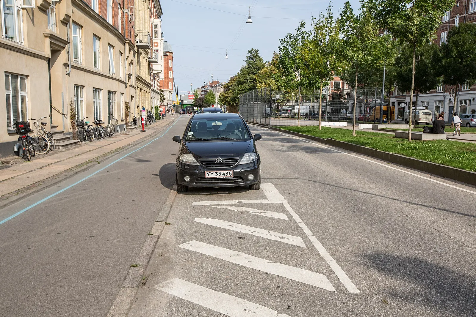 A protected bike lane along a city street