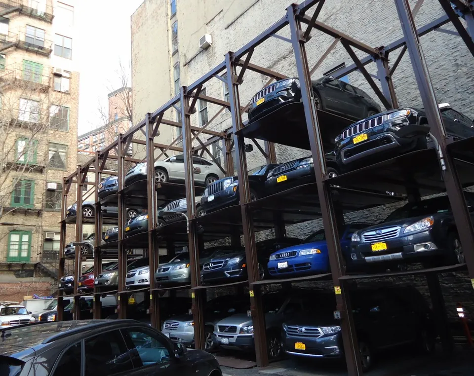 Cars parked in a multi-level structure.