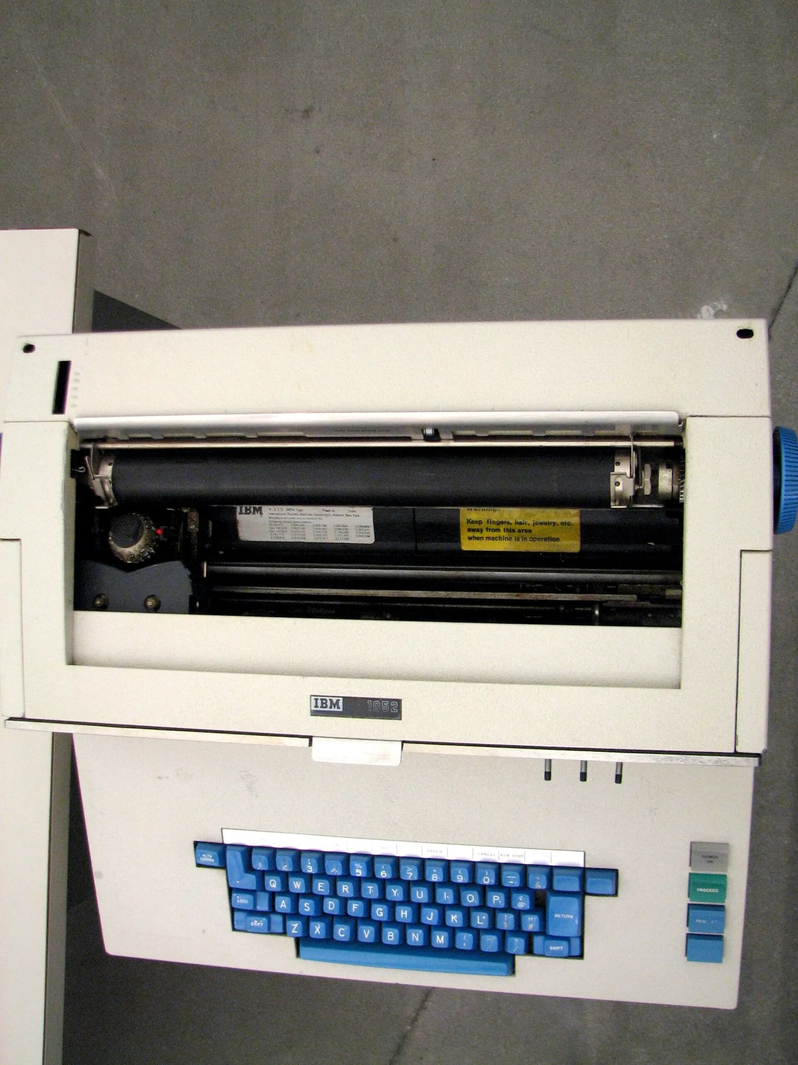 An IBM System/360 mainframe computer with a teletype terminal